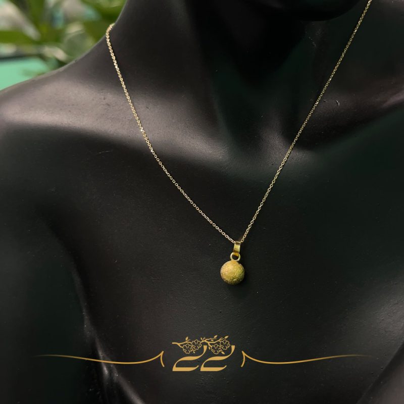 Golden sphere necklace